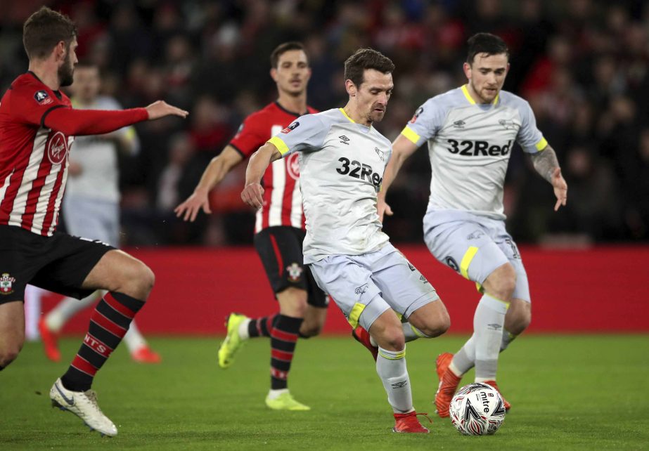 Derby County's Craig Bryson on his way to scoring his side's first goal of the game against Southampton, which is later ruled out by a VAR decision, during their English FA Cup third round replay soccer match at St Mary's Stadium in Southampton, Englan