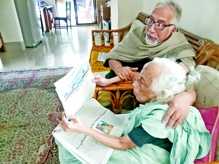Professor Dr Anwarul Karim along with his mother and artworks