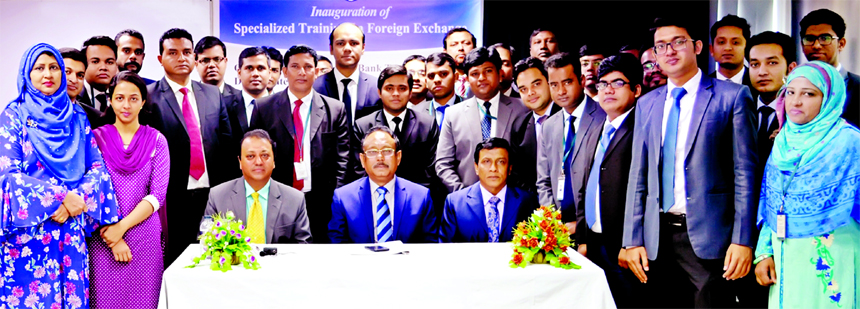 Md. Quamrul Islam Chowdhury, AMD of Mercantile Bank Limited, poses for a photograph with the participants of seven days long training course on "Specialized Training on Foreign Exchange" at the Banks Training Institute in the city recently. Javed Tariq,