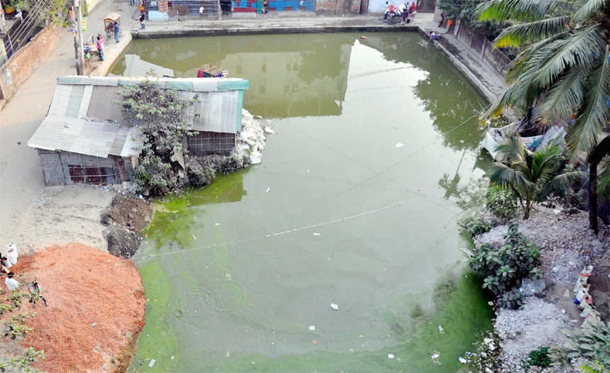 The thousand years old pond at Pahartoli area has been grabbed by influential businessmen. This snap was taken yesterday.