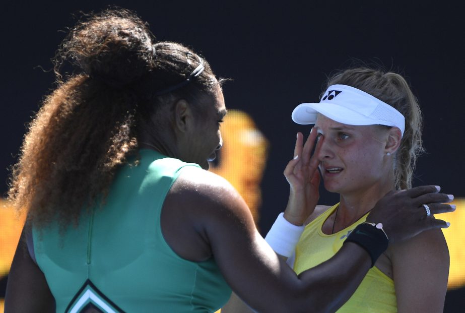 United States' Serena Williams (left) consoles Ukraine's Dayana Yastremska after winning their third round match at the Australian Open tennis championships in Melbourne, Australia on Saturday.