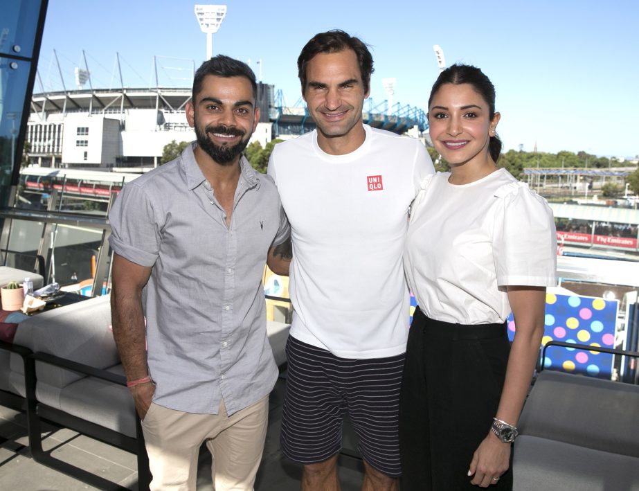 Indian cricket captain Virat Kohli (left) and his wife Anushka Sharma pose for a photo with Switzerland's Roger Federer at the Australian Open tennis championships in Melbourne, Australia on Saturday.