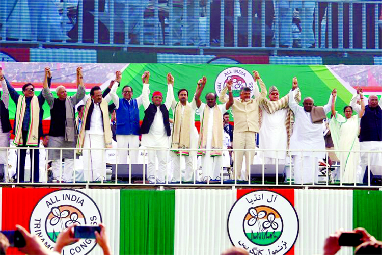 Leaders of India's main opposition parties join their hands together during "United India" rally ahead of the general election, in Kolkata.