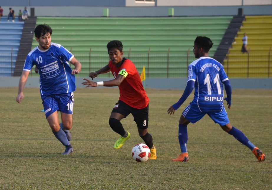 A moment of the football match of the Bangladesh Premier League between Sheikh Russel Krira Chakra Limited and Arambagh Krira Sangha at Rafiquddin Bhuiyan Stadium in Mymensingh on Sunday. Sheikh Russel won the match 1-0.