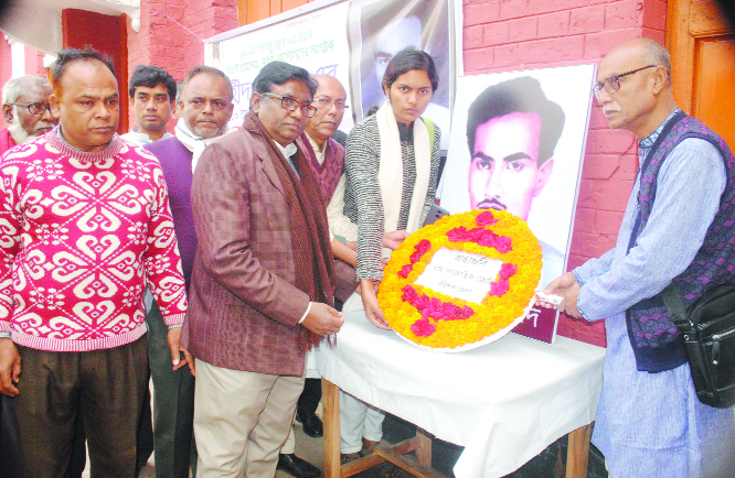 BARISHAL: Leaders of different social and political organisations placing wreaths at the portrait of Shahed Asad marking the Shaheed Asad Dibas on Sunday.