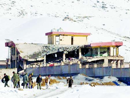 The shattered remains of a central Afghanistan army base which was attacked by a Taliban suicide car bomber.