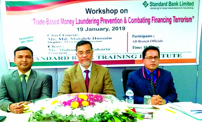 Md. Motaleb Hossain, DMD of Standard Bank Limited, presiding over a day-long workshop on "Trade-Based Money Laundering Prevention & Combating Financing Terrorism" at the Bank's Training Institute in the city recently. Md. Saiful Islam, Head of Anti-Mon