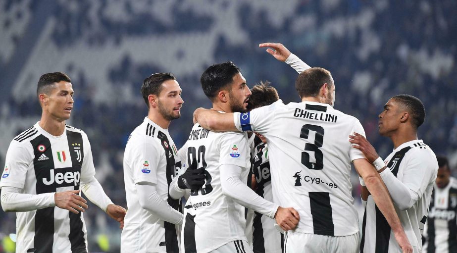 Juventus' Emre Can (third from left) celebrates with teammates (from left) Cristiano Ronaldo, Mattia De Sciglio, Giorgio Chiellini and Douglas Costa after scoring his side's second goal during the Serie A soccer match between Juventus and Chievo Verona