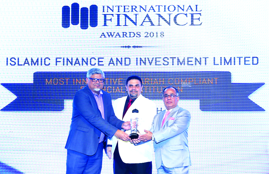 Anis Salahuddin Ahmad, Vice-Chairman, Board of Directors of Islamic Finance and Investment Limited (IFIL) along with A Z M Saleh, Managing Director of the company, receiving the 'International Finance Award 2018' in the category of the 'Most Innovative