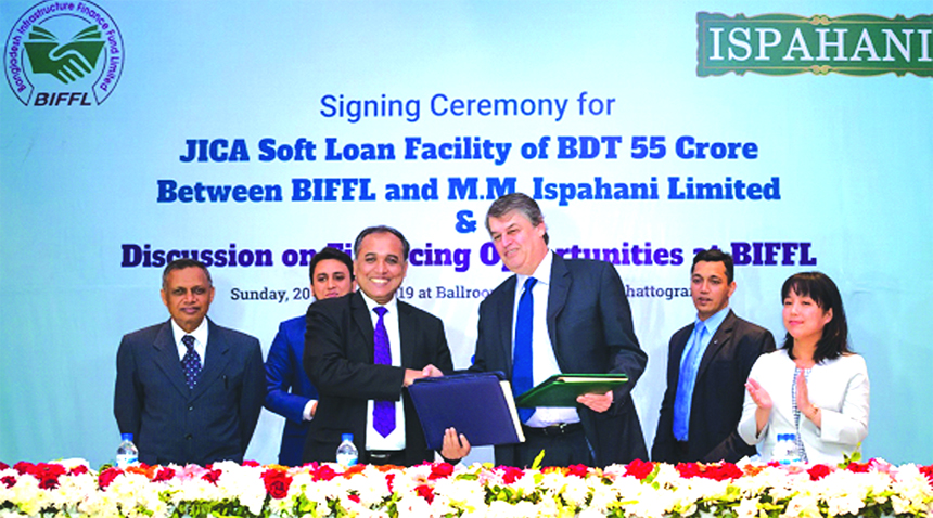 S M Formanul Islam, CEO of Bangladesh Infrastructure Finance Fund Limited (BIFFL) and Mirza Salman Ispahani, Chairman of MM Ispahani Limited, exchanging an agreement signing document for a financing up to Tk. 55crore under the Energy Efficiency & Conserva