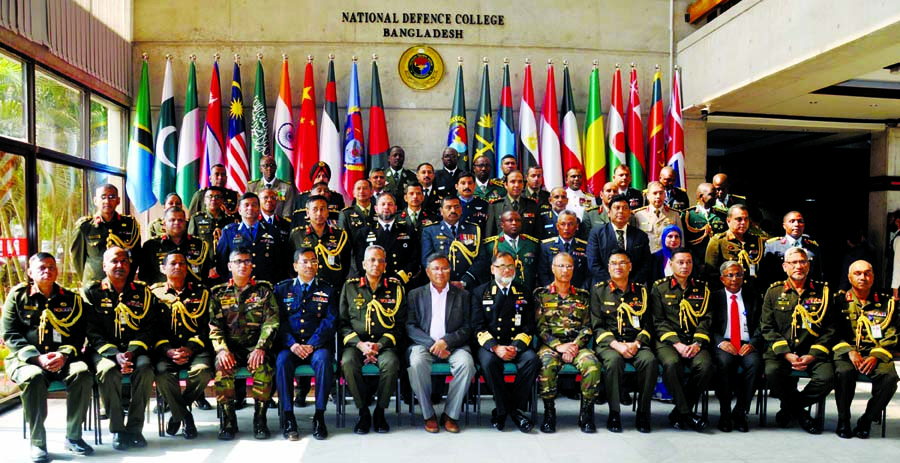 Information Minister Dr. Hasan Mahmud along with army officials poses for a photo session at the inaugural ceremony of a programme on 'Education 4.0' in the auditorium of National Defence College at Mirpur Cantonment in the city on Thursday. ISPR photo