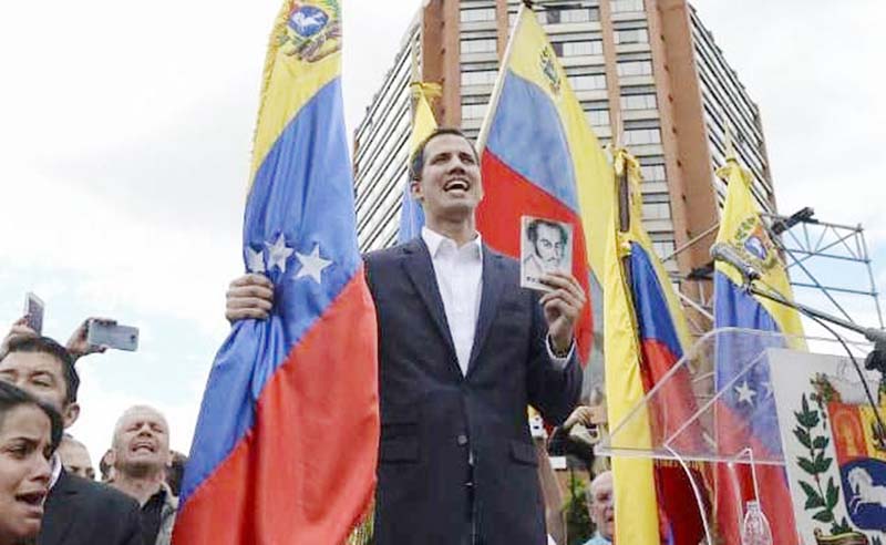 Venezuela's National Assembly head Juan Guaido declares himself the country's acting President.