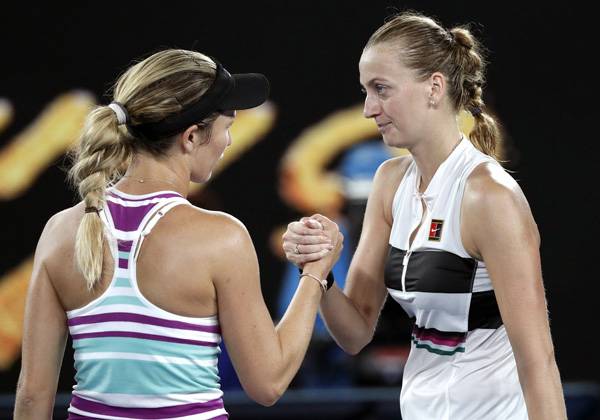 Petra Kvitova (right) of the Czech Republic is congratulated by United States' Danielle Collins after winning their semifinal at the Australian Open tennis championships in Melbourne, Australia on Thursday.
