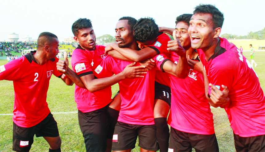 Players of Arambagh Krira Sangha celebrating after beating Dhaka Mohammedan Sporting Club Limited by 4-1 goals in their football match of the Bangladesh Premier League at Rafiquddin Bhuiyan Stadium in Mymensingh on Friday.