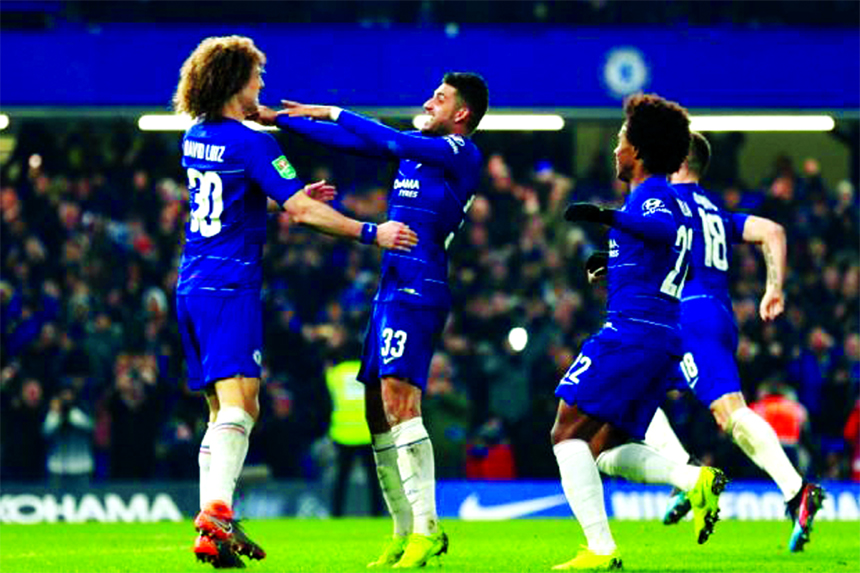 Players of Chelsea celebrating after beating Tottenham Hotspur on penalties in their League Cup semi-final match in London on Thursday.