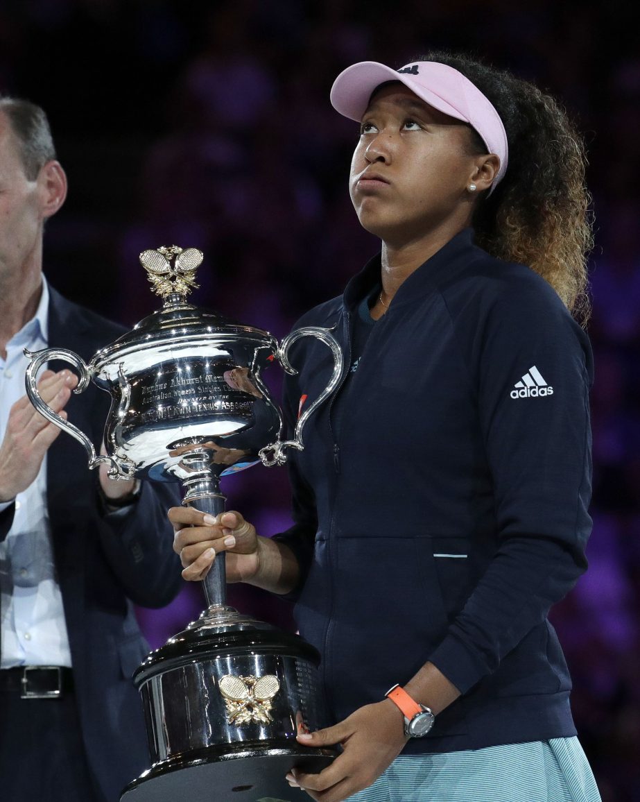 Japan's Naomi Osaka holds the trophy after defeating Petra Kvitova of the Czech Republic during the women's singles final at the Australian Open tennis championships in Melbourne, Australia on Saturday.