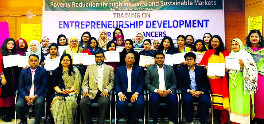 Md. Mahbubur Rahman, joint secretary of Industries Ministry and Project Director of PRISM programme, poses for a photograph with the participants of a 5 days long training programme on 'Entrepreneurship Development Training for ICT Freelancer' jointly o