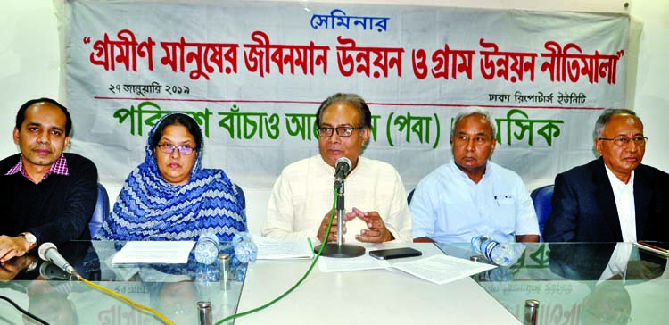 Abu Naser Khan, Chairman, Poribesh Bachao Andolon speaking at a seminar on development of living standard of rural people and guideline of village development at Dhaka Reportersâ€™ Unity yesterday .