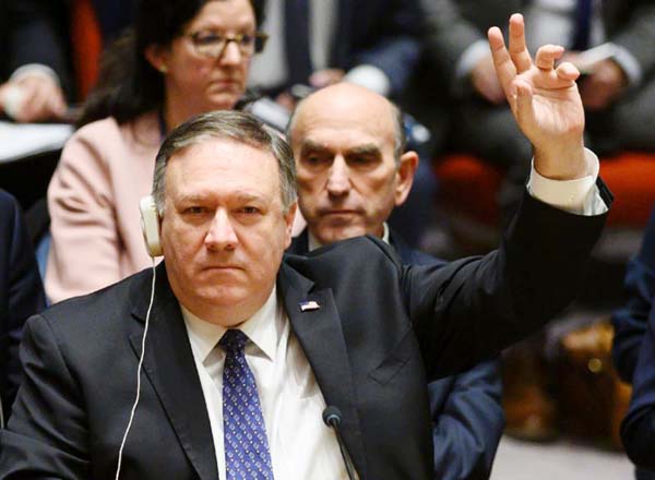 US Secretary of State Mike Pompeo votes at a United Nations Security Council meeting on Venezuela on Saturday.