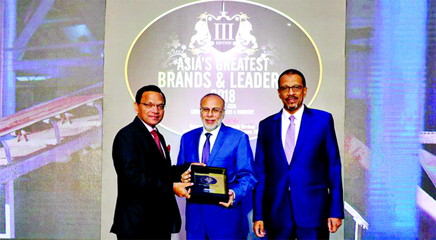 Sakif Arif Tabani, Managing Director of Khadim Ceramic Ltd, receiving an "Asia's Greatest Brands Award" for outstanding contribution in ceramic sector of construction industries at Marina Bay Expo and convention center in Singapore recently.