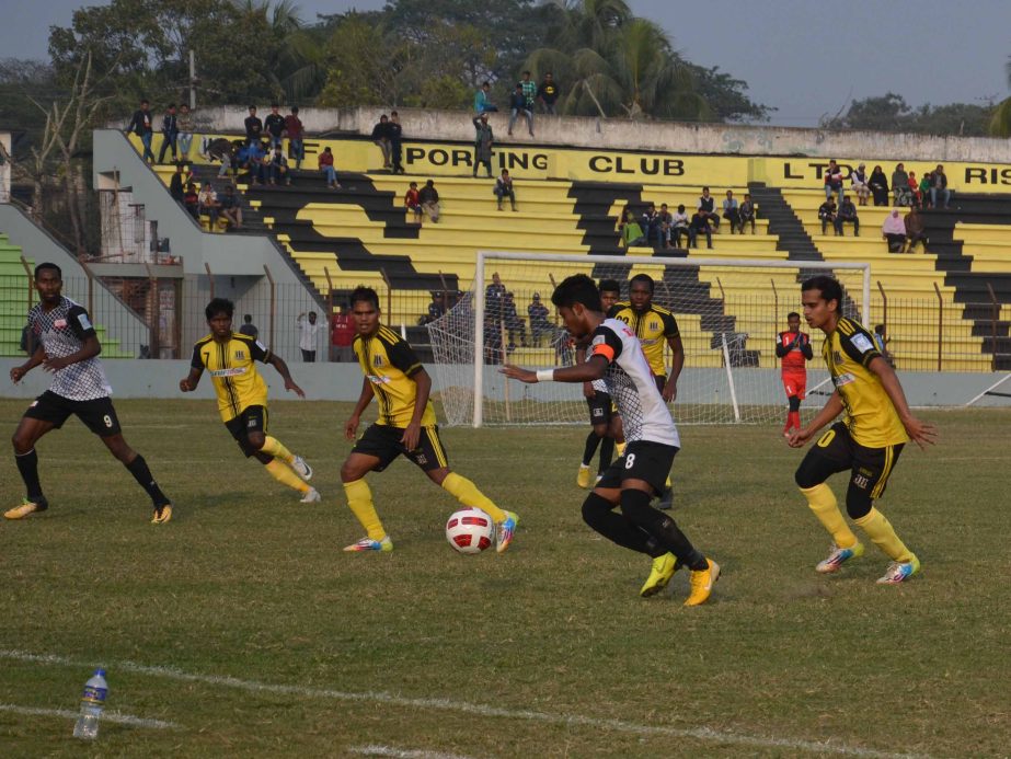 A moment of the football match of the Bangladesh Premier League between Arambagh Krira Sangha and Saif Sporting Club at Rafiquddin Bhuiyan Stadium in Mymensingh on Tuesday. Arambagh won the match 1-0.