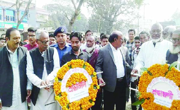 GOURIPUR (Mymensingh): Freedom Fighter Adv Nazim Uddin Ahmed MP placing wreaths on the Shaheed Harun monument in observance of the 50th martyrdom anniversary of Harun, a hero of 1969 mass upsurge at Harun Park in Upazila town on Sunday.
