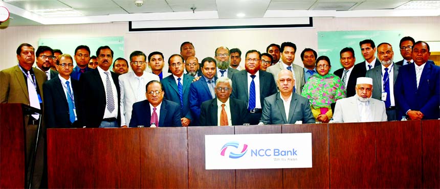 Md. Amirul Islam, FCA, FCS, Chairman of Audit Committee of the Board of Director of NCC Bank Ltd, inaugurating a day-long workshop on "Effective Branch Audit" at its Training Institute recently. Khondoker Nayeemul Kabir and Md. Habibur Rahman, Deputy Ma