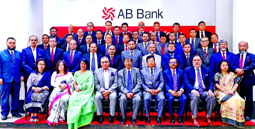 Kaiser A. Chowdhury, Director, AB Bank Limited, poses for photo session with the participants of training on "Internal Credit Risk Rating System (ICRRS) and CRM Policy" at its Training Academy recently. Tarique Afzal, Managing Director (CC) was also pre