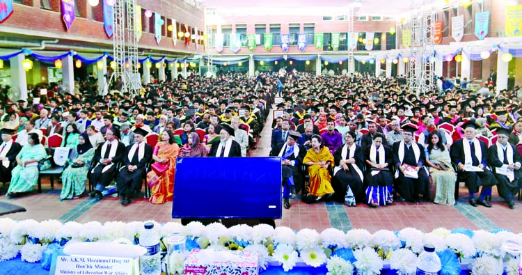 Liberation War Affairs Minister AKM Mozammel Huq along with UGC Chairman Prof Abdul Mannan, Vice-Chancellor, teachers and students of East West University at the 18th convocation of the university on its campus in the city's Aftabnagar on Wednesday.