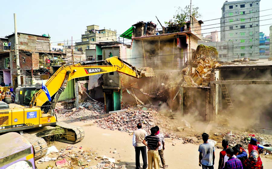 Bangladesh Railway authority evicting unauthorised establishments on their own lands recovering from illegal encroachers in city's Doyaganj area on Wednesday.