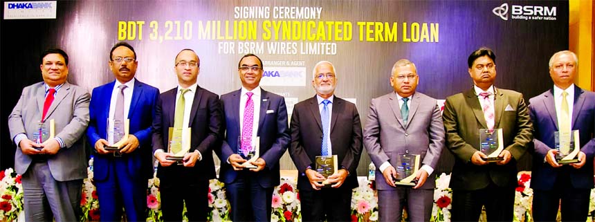 Ali Hussain Akber Ali, Managing Director of BSRM Wires Limited along with Syed Mahbubur Rahman, Managing Director of Dhaka Bank Limited, poses for a photograph after signing the syndicated term loan of Tk 3,210.00 million for BSRM Wires Limited, a wire ma