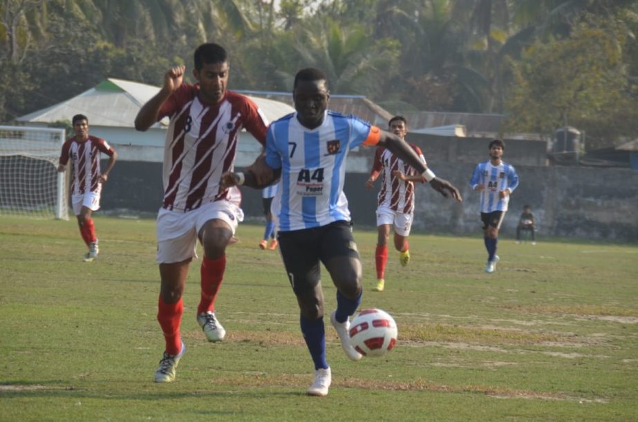 A view of the football match of the Bangladesh Premier League between Sheikh Jamal Dhanmondi Club and Team BJMC at Shaheed Bhulu Stadium in Noakhali on Saturday.