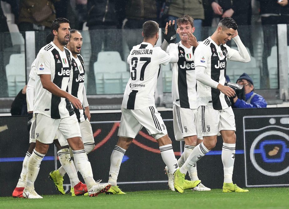 Juventus' Daniele Rugani (2nd right) reacts after scoring his side's second goal during the Serie A soccer match Juventus and Parma at the Allianz Stadium in Turin, Italy on Saturday.