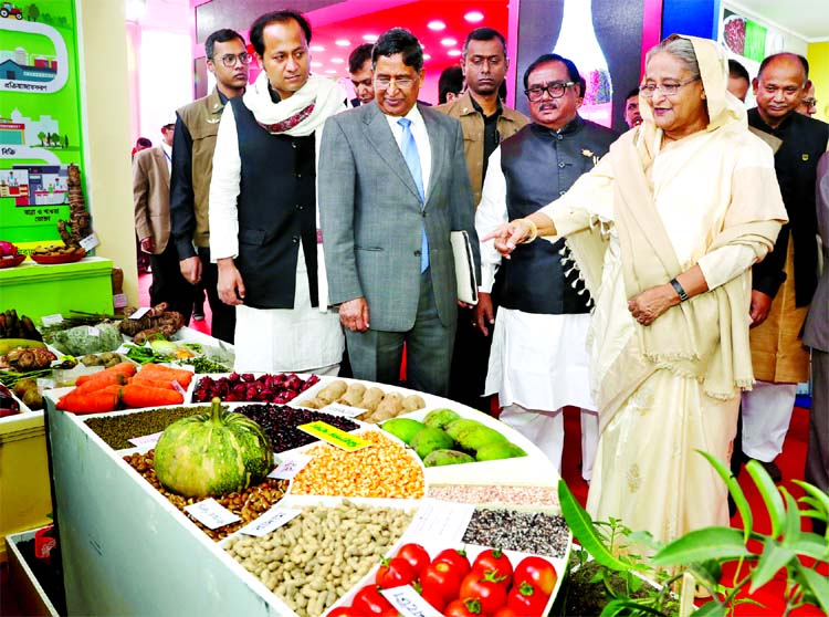 Prime Minister Sheikh Hasina visiting different stalls of National Food Safety Fair at Krishibid Institution in city's Farmgate on Sunday.