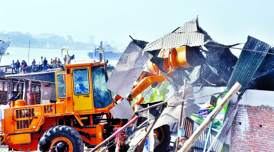 CDA conducts long waited eviction drive and demolishes over 2500 illegal structures built on both the banks of the River Karnaphuli on Monday.