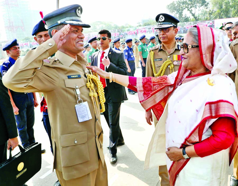 Prime Minister Sheikh Hasina handing over awards to 349 police and Rapid Action Battalion (RAB) personnel for their outstanding performance, honesty and discipline while attending the five-day long Police Week-2019 at Rajarbagh Police Lines on Monday. CID