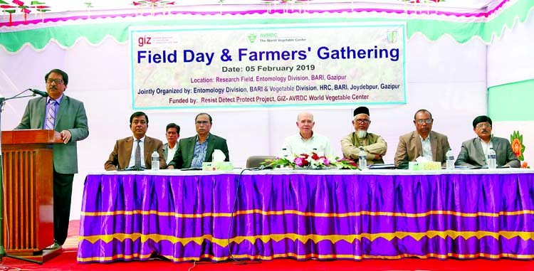 Director General of Bangladesh Agriculture Research Institute (BARI) Dr. Abul Kalam Azad along with other distinguished persons at Field Day and Farmers' Gathering organised jointly by Entomology Division and Vegetable Division of BARI at the research f