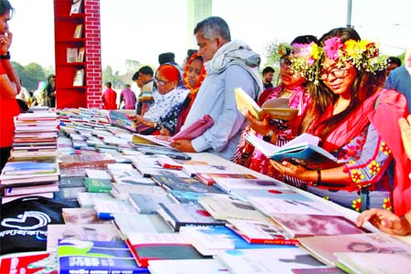 Book-lovers throng the fair everyday and choosing their best one in a festive mood at Bangla Academy Book Fair on Tuesday.