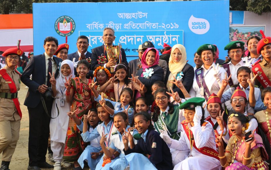 The winners of the Inter-House Annual Sports Competition of Dhaka Cantonment Girls' Public School & College with the chief guest Commandant of National Defence College Lieutenant General Sheikh Mamun Khaled and the other teachers of the College pose for