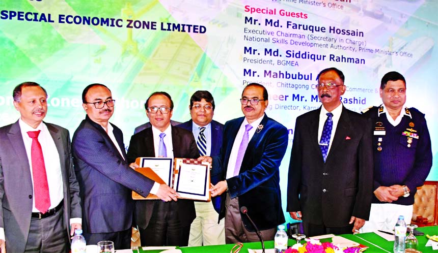 Md Faruque Hossain, Executive Chairman (Secretary in Charge, National Skill Development Authority, Prime Minister's Office, handing over a pre-qualification license to Engineer M A Rashid, Managing Director of Karnafuli Dry-dock Special Economic Zone Lim