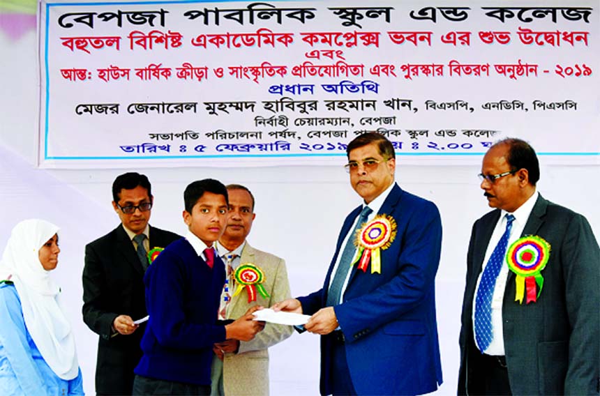 BEPZA Executive Chairman Major General Mohd Habibur Rahman Khan, BSP, ndc, psc distributing a scholarship cheque of Tk 6 lakh 35 thousand to 135 poor and meritorious students of BEPZA Public School and College of Dhaka EPZ on Tuesday. Most of them are the