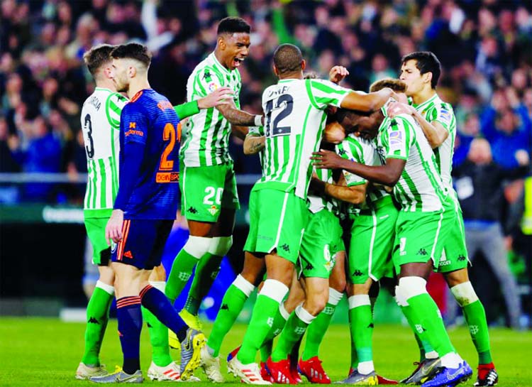 Real Betis captain Joaquin scored a remarkable goal straight from a corner in his side's Copa del Rey semi-final first leg at home to Valencia on Thursday, but the visitors fought back from two goals down to snatch a 2-2 draw.