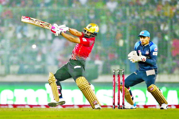 Tamim Iqbal of Comilla Victorians plays a shot during the final match of the UCB 6th Bangladesh Premier League (BPL) T20 cricket between Dhaka Dynamites and Comilla Victorians at the flood-lit Sher-e-Bangla National Cricket Stadium in the city's Mirpur o