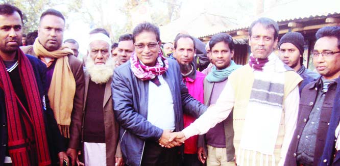 SAGHATA(Gaibandha): Jahangir Alam, Joint Secretary, Jubo League and aspirant chairman candidate from Saghjta Upazila Parishad greeting general people during an election campaign recently.
