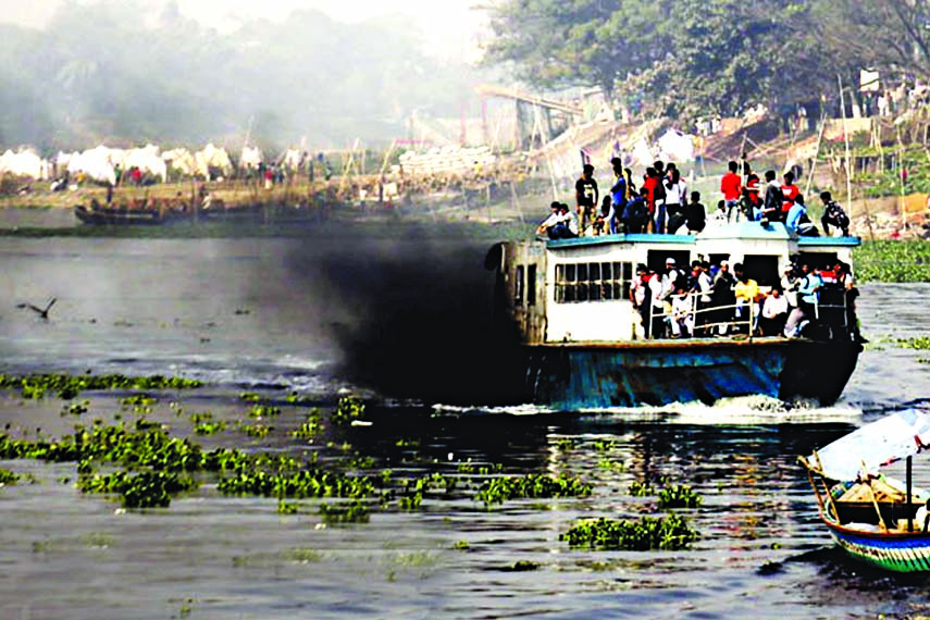 The emanating black smoke from burned mobil of the unfit motor launches pollutes the water of river Buriganga in absence of monitoring by any authority. This photo was taken from Sadarghat area on Saturday.