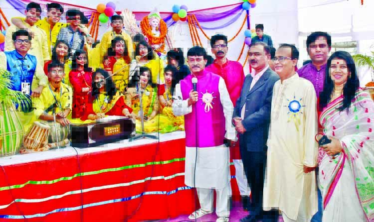 Chairman of the Governing Body of the city's Willes Little Flower School and College Muhammad Arifur Rahman Titu speaking at a discussion organised on the occasion of Saraswati Puja on the premises of the institution on Sunday.