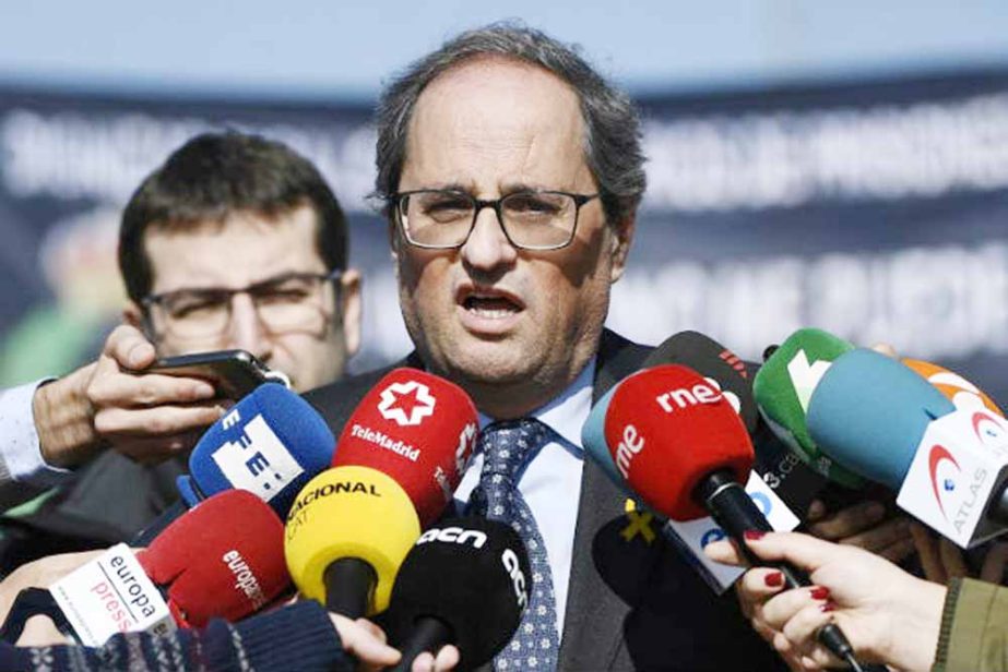 Catalan regional president Quim Torra speaks to the press after visiting jailed Catalan separatist leaders at the Soto del Real prison in Madrid.