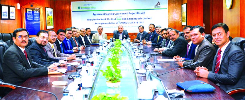 AKM Shaheed Reza, Chairman of Mercantile Bank Limited, poses for a photograph after signing an agreement with Fortress Data Services (FDS Bangladesh Limited) for re-implementation of Temenos T24 R18 TAFJ on Tuesday at the Bank's head office in the city.