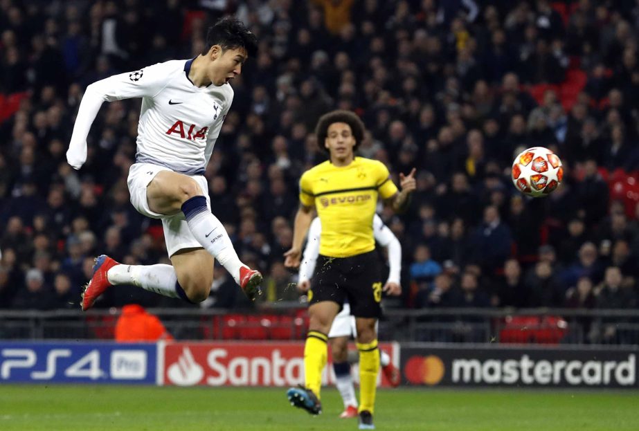 Tottenham midfielder Son Heung-min scores the opening goal during the Champions League round of 16, first leg soccer match between Tottenham Hotspur and Borussia Dortmund at Wembley stadium in London on Wednesday.