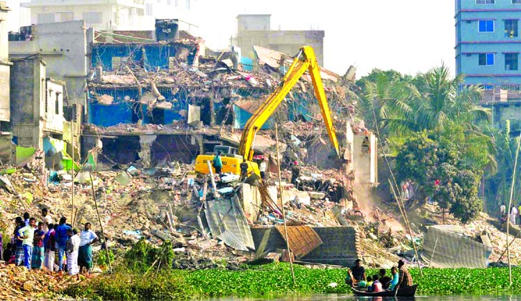 BIWTA continues eviction of illegal structures on Buriganga River banks. This photo was taken from Kamrangirchar area on Thursday.